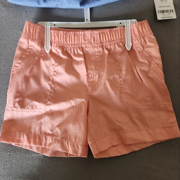 T-shirt and shorts set. Shorts have front pockets. Shirt has real buttons - Picture 1 of 3